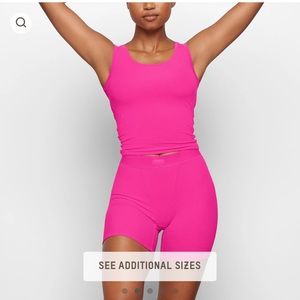 NEW WITH TAGS- Skims hot pink bottoms (Large)